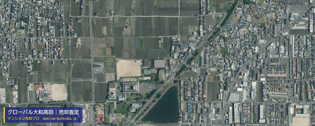 グローバル大和高田の売却査定・買取価格｜大和高田市東中（マンション売却プロ作成の航空写真（町の中心））